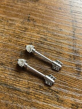Heart bow & arrow nipple piercing